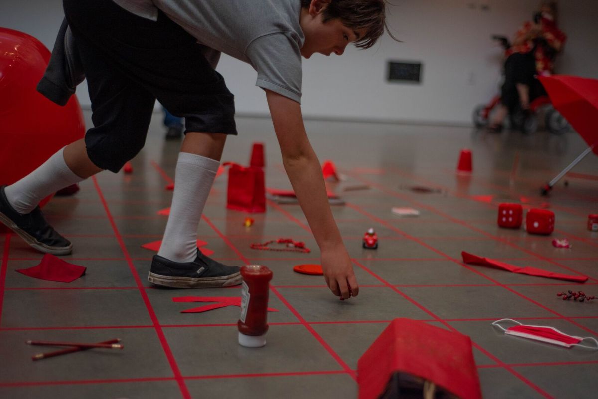 Alison Knwoles attends the opening of  her "Celebration Red"  installation at BAMPFA, July 23 th. 