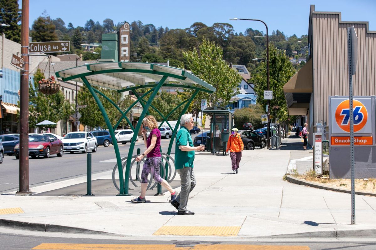 People walk at the intersection of Solano and Colusa avenues in North Berkeley
