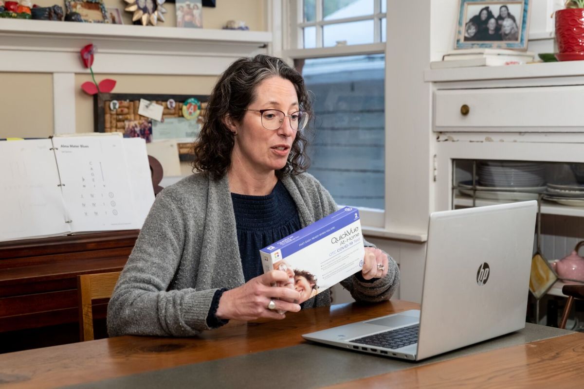 Dr. Maggie Edmunds works from the dining table in her Berkeley home on January 25, 2022. Credit: Kelly Sullivan