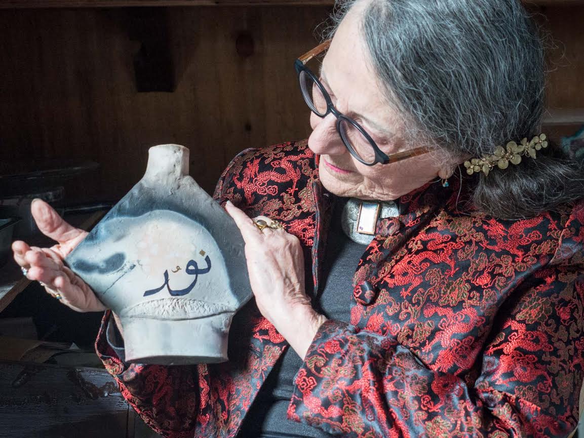 Susan Felix, a ceramic artist and Berkeley's art ambassador, holds one of her pieces. Photo: Richard Stangl